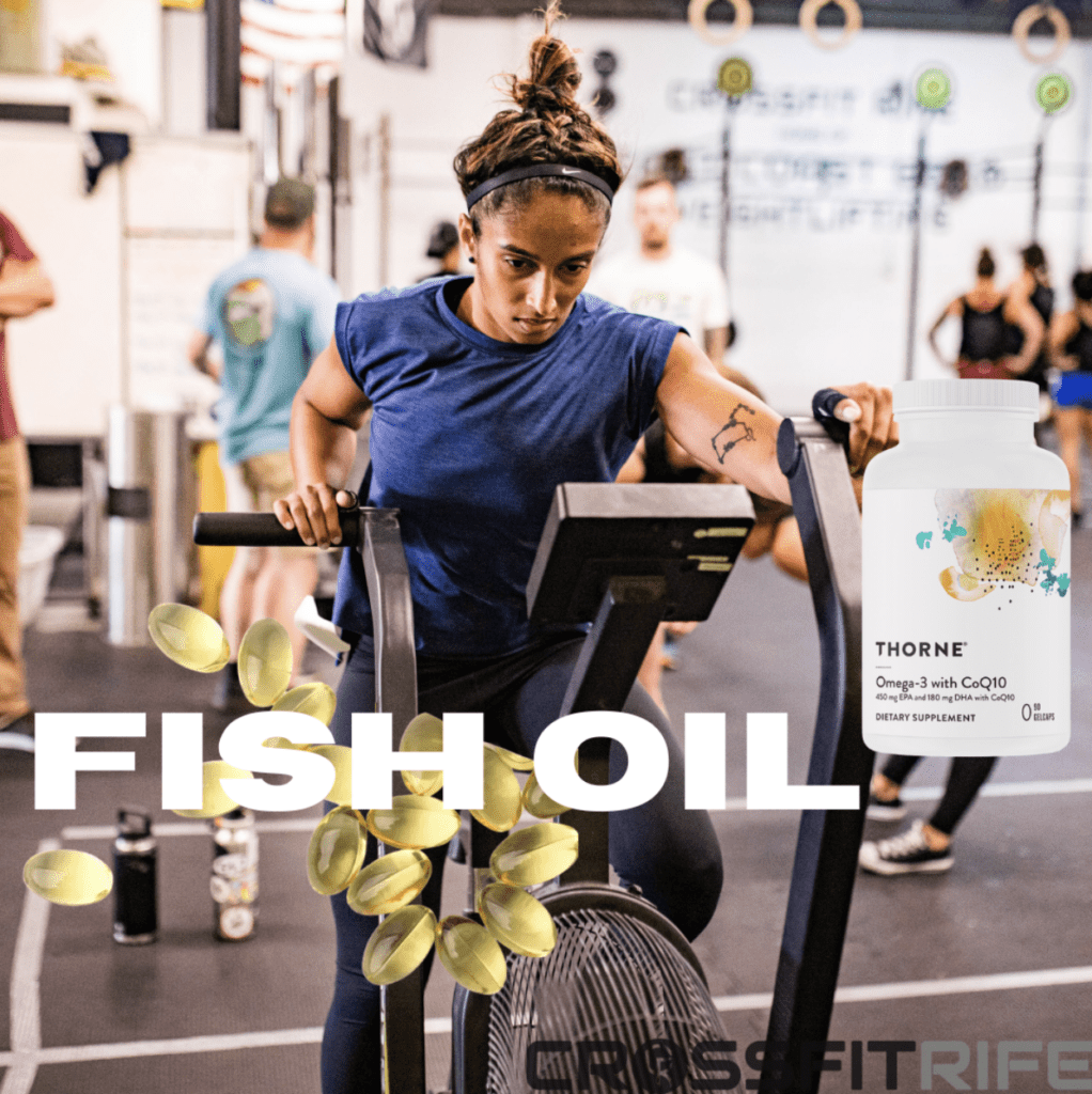 Girl riding a fan bike in the gym