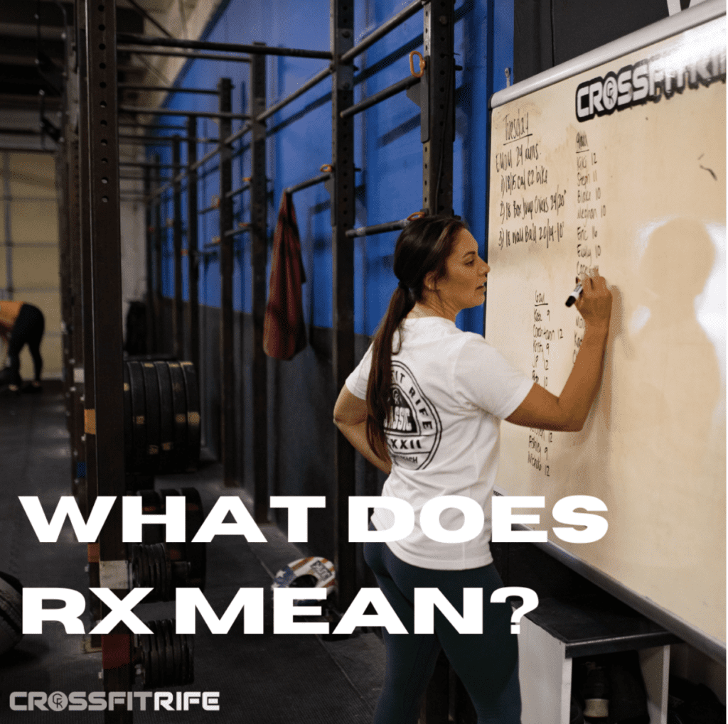 Coach writing on the white board at CrossFit Rife