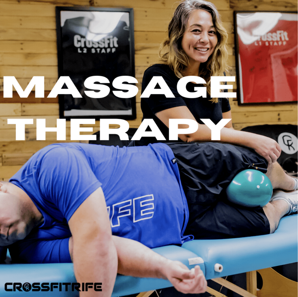 massage therapist trating athlete on therapy table